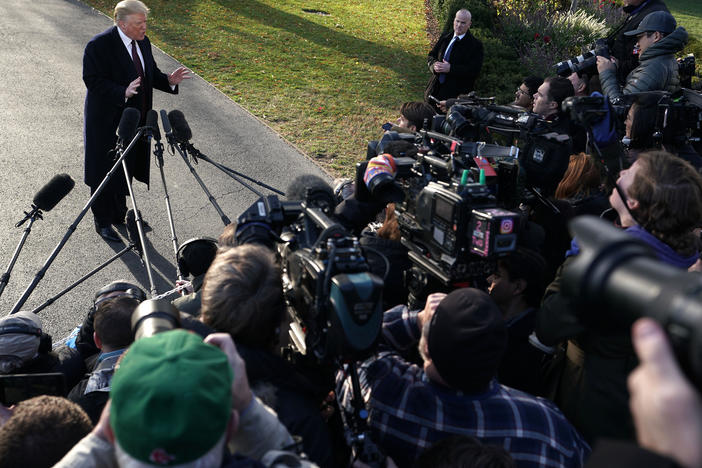 Donald Trump speaks to members of the media in November 2018.
