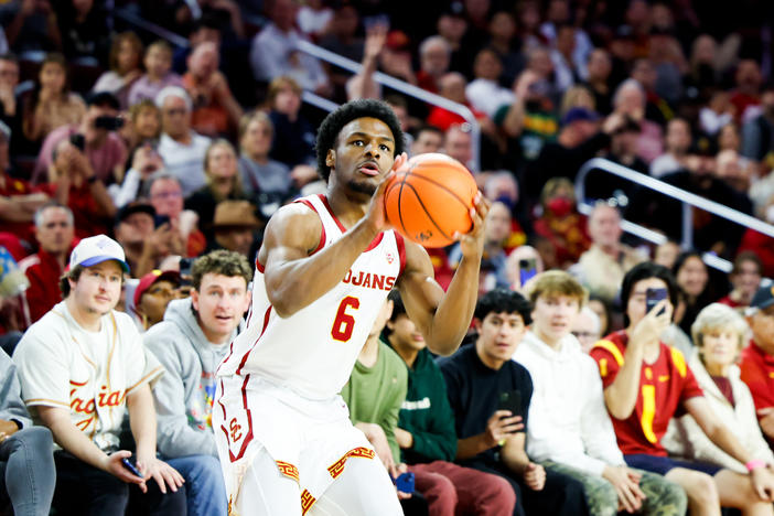 Bronny James shoots the ball during his debut on the court playing for University of Southern California on Sunday.