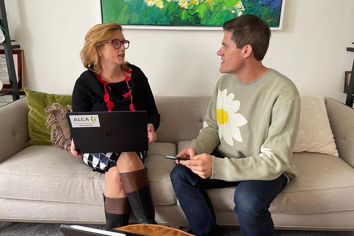 Anne Sansevero discusses a client with one of her nurses, Beau Romero. Sansevero has seven employees in her growing private care management business in New York City.