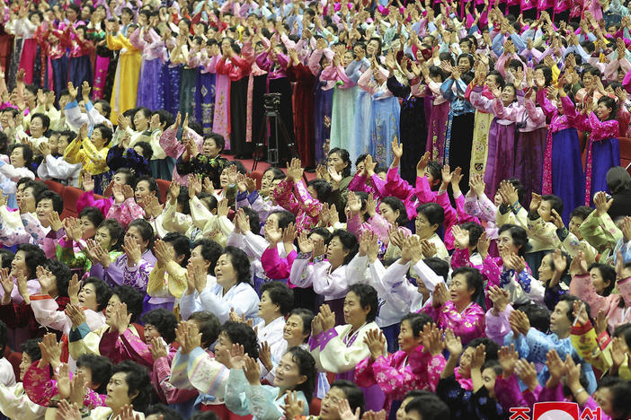 This photo provided by the North Korean government, North Korean women attend the National Mothers' Meeting in Pyongyang, North Korea on Dec. 3, 2023. The content of this image is as provided and cannot be independently verified.
