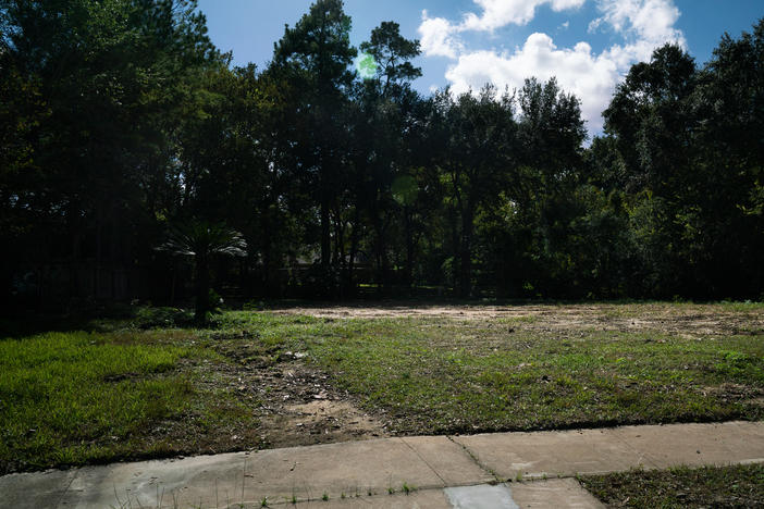 An empty lot where a house once stood in Houston. The former residents moved because of flood damage. A new study suggests that people are moving away from the most flood-prone neighborhoods in cities that are otherwise growing in population.