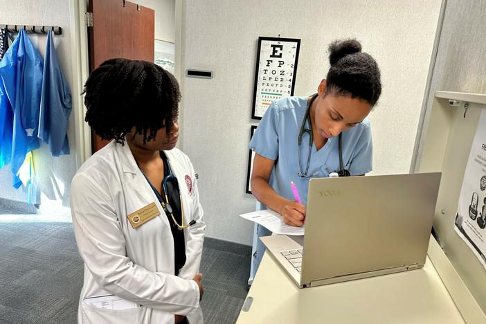 Kaniya Pierre Louis (left) is a third-year medical student shadowing Dr. Zita Magloire for the day. Pierre Louis says she appreciates Magloire as a role model and an example of excellence.