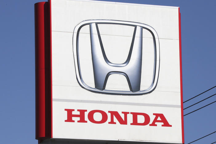 The logo of Honda Motor Co., is seen in Yokohama, near Tokyo on Dec. 15, 2021. Honda Motor's American arm is recalling more than 2.5 million vehicles in the U.S. due to a fuel pump defect that can increase risks of engine failure or stalling while driving.