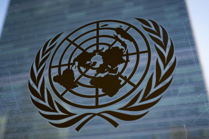 The symbol of the United Nations is displayed outside the Secretariat Building at U.N. headquarters.