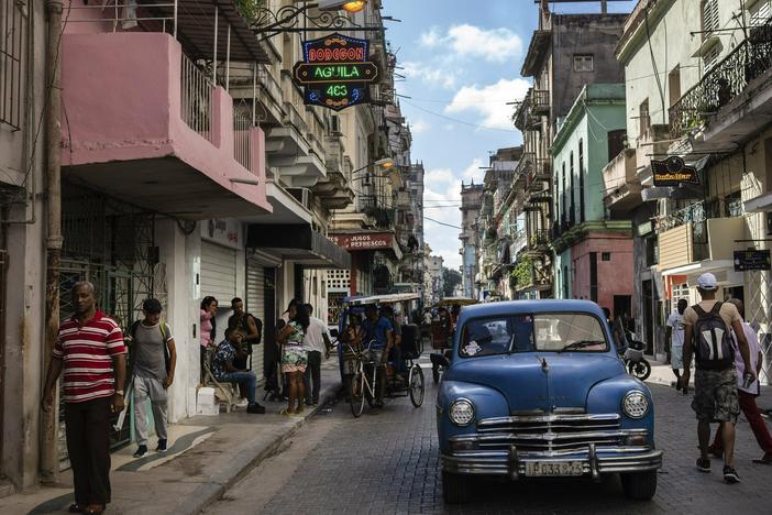 An American classic car makes its way down a street in Havana, Cuba, Nov. 11, 2023.