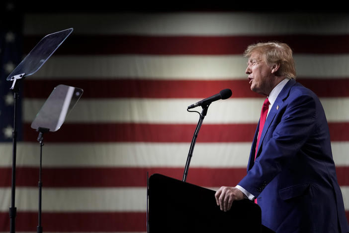 Former President Donald Trump speaks during a rally Sunday, Dec. 17, 2023, in Reno, Nev. In a brief filed Saturday, Trump asked a federal appeals court to dismiss an election interference case against him, arguing he's immune from prosecution.