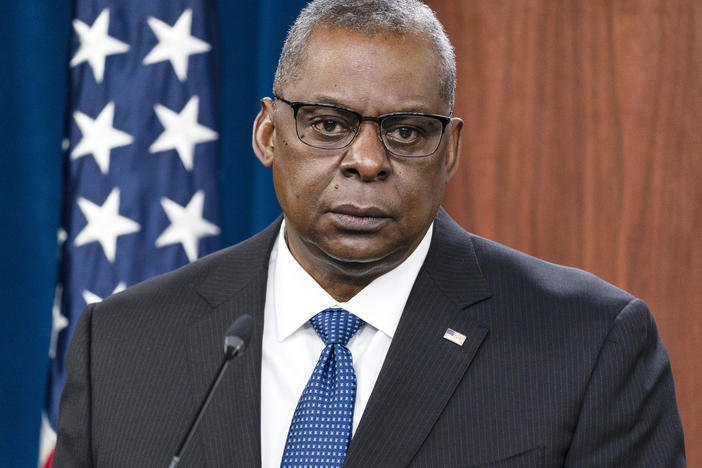 Secretary of Defense Lloyd Austin speaks during a media briefing at the Pentagon on Jan. 28, 2022.