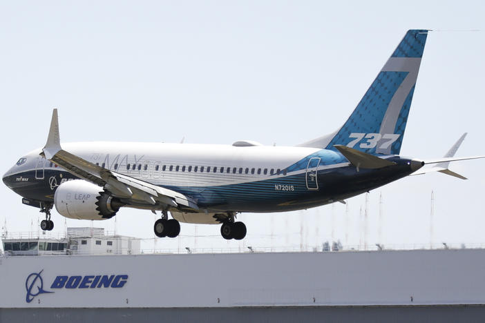 A Boeing 737 MAX jet lands following a Federal Aviation Administration test flight at Boeing Field in Seattle, Wash., in June 2020.