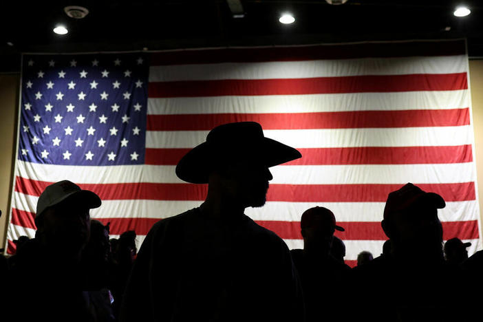 Supporters of former U.S. President Donald Trump look on before the start of a campaign rally at the Reno-Sparks Convention Center on Dec. 17 in Nevada.