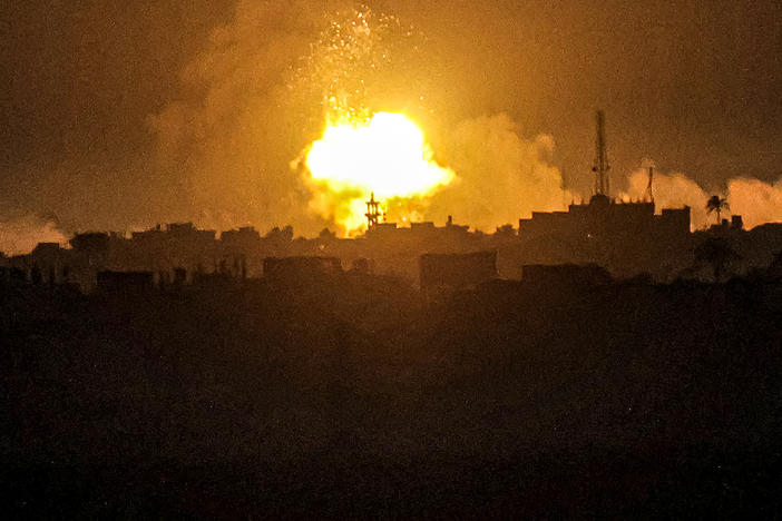 A fireball from an explosion erupts during Israeli bombardment on Khan Younis from Rafah in the southern Gaza Strip early on Wednesday.