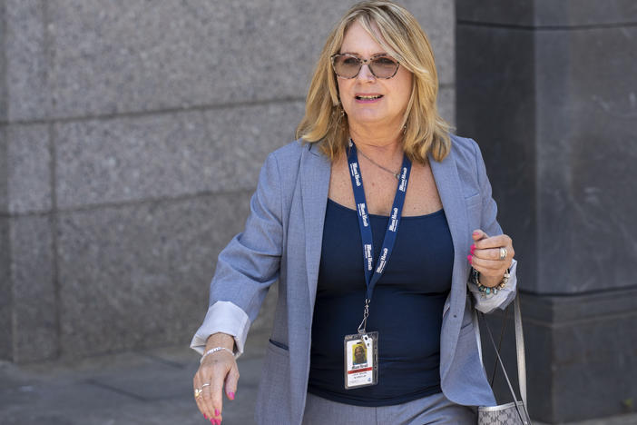 Reporter Julie K. Brown exits federal court following a bail hearing for Jeffrey Epstein in July 2019.