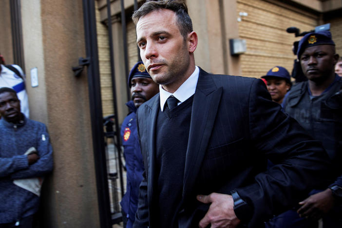 South African Paralympian Oscar Pistorius leaves the Pretoria High Court on June 15, 2016, after the third day of his resentencing hearing for the 2013 murder of his girlfriend Reeva Steenkamp. Pistorius was released from Pretoria prison on Friday after serving nearly 11 years.