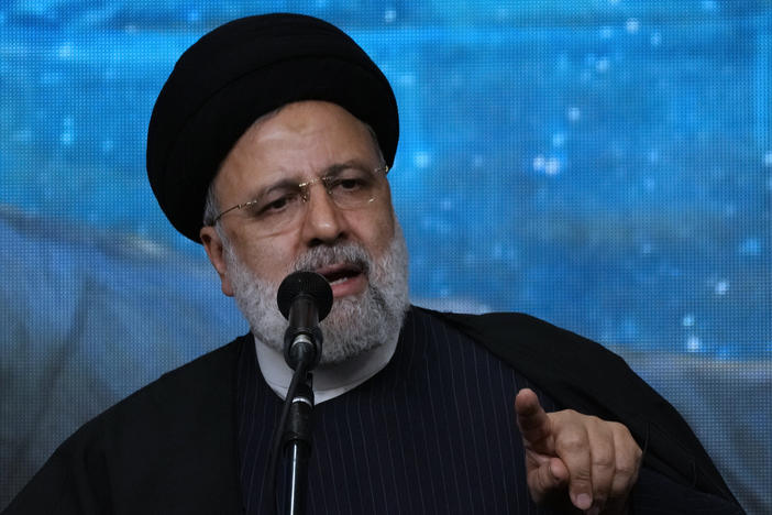 Iranian President Ebrahim Raisi speaks at a mosque in the capital Tehran on Tuesday. Iran manages a network of proxy groups throughout the Middle East that are battling U.S. and Israeli forces on multiple fronts.