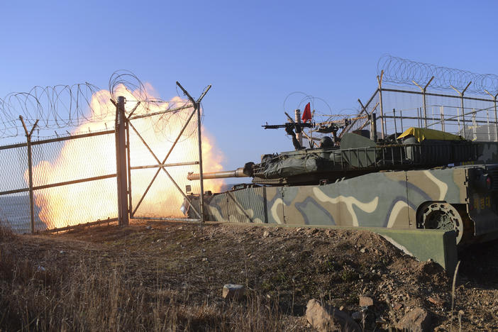 A South Korean tank fires during exercises at the Northwest Islands area of South Korea on Friday.