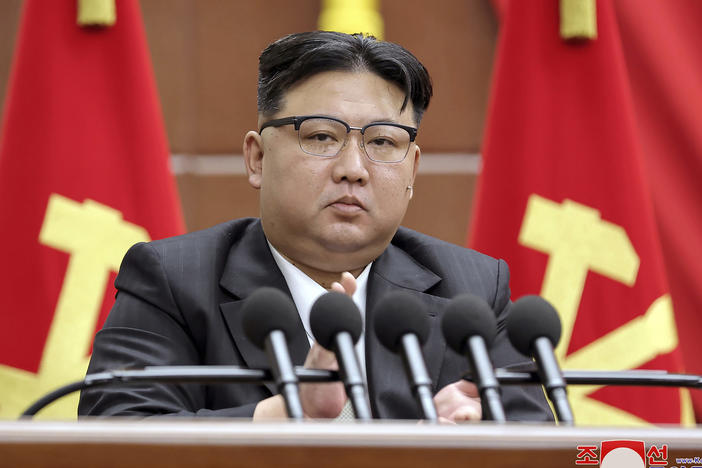 In this photo provided by the North Korean government, North Korean leader Kim Jong Un delivers a speech during a year-end plenary meeting of the ruling Workers' Party, which was held between Dec. 26 and Dec. 30 in Pyongyang, North Korea.