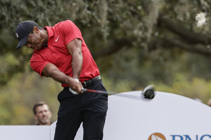 Tiger Woods tees off on the 13th hole during the final round of the PNC Championship golf tournament on Dec. 17 in Orlando, Fla.
