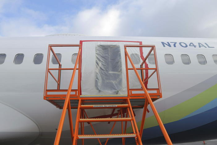 This photo shows the gaping hole where the panel used to plug an area reserved for an exit door on a Boeing 737 Max 9 jetliner blew out Jan. 5, shortly after the flight took off from Portland, Ore., forcing the plane to return to Portland International Airport.