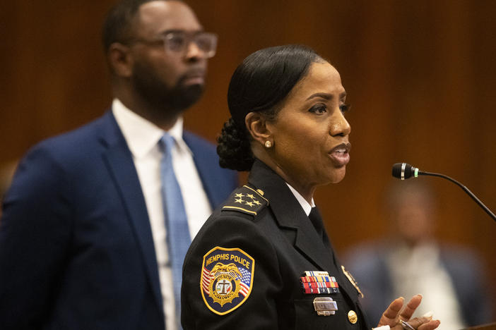 Memphis Police Chief Cerelyn "C.J." Davis speaks to the city council as Mayor Paul Young stands behind her at city hall on Tuesday.
