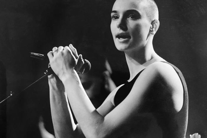 Sinéad O'Connor died of natural causes according to a coroner's statement. She's pictured above performing in Vancouver, Canada in the late 1980s.