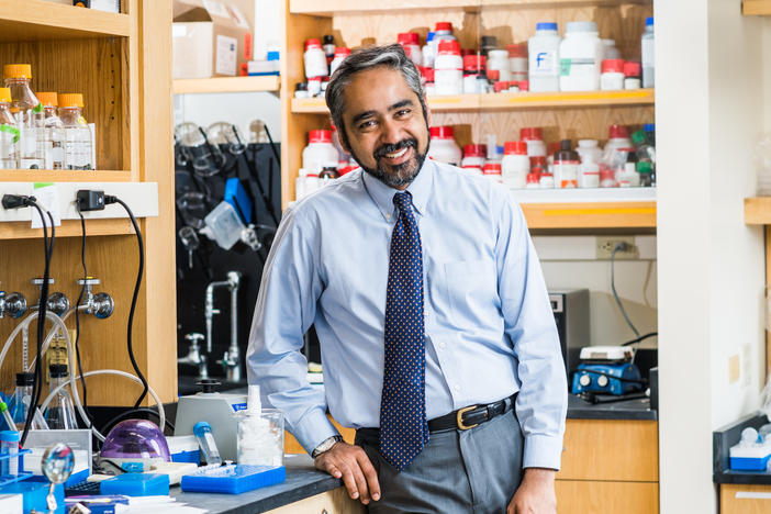 Muhammad Zaman, author of the book <em>We Wait for a Miracle</em><em>,</em> in his lab at Boston University.