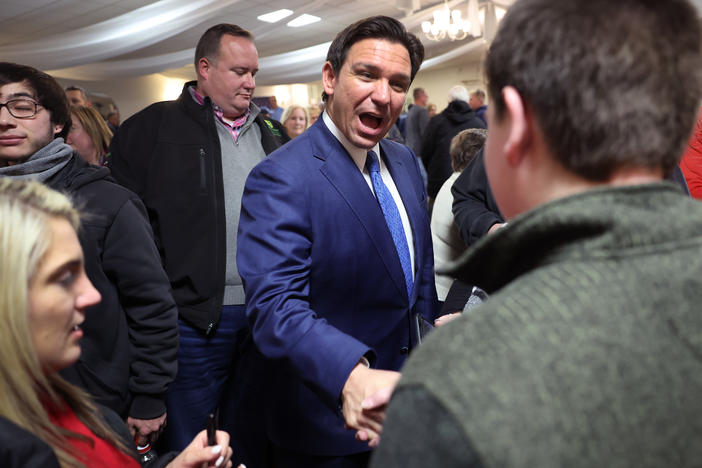 Republican presidential candidate and Florida Gov. Ron DeSantis greets guests after speaking during the Scott County Fireside Chat at the Tanglewood Hills Pavilion in Bettendorf, Iowa.