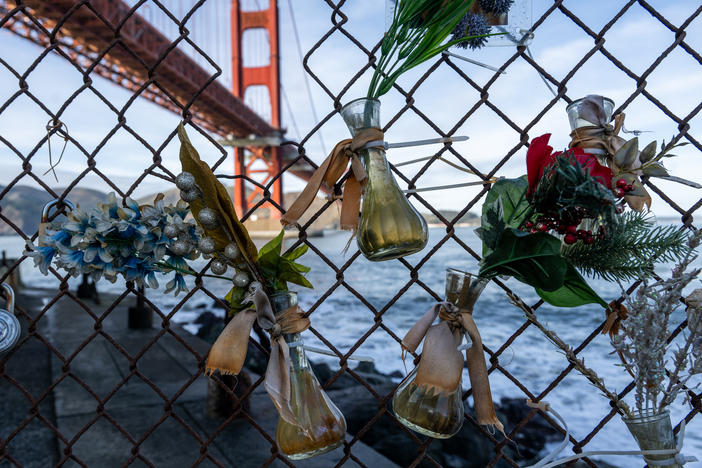 A memorial for those who have died on the Golden Gate Bridge covers a fence at Fort Point in San Francisco on Jan. 8, 2024.
