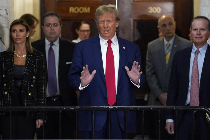 Former President Donald Trump speaks to members of the media as he arrives at the New York State Supreme Court during the civil fraud trial against the Trump Organization in New York City on Jan. 11, 2024.