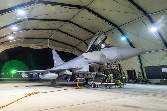 In this handout image provided by the U.K. Ministry of Defence, an RAF Typhoon aircraft returns to berth following a strike mission on Yemen's Houthi rebels at RAF Akrotiri on Friday in Akrotiri, Cyprus.