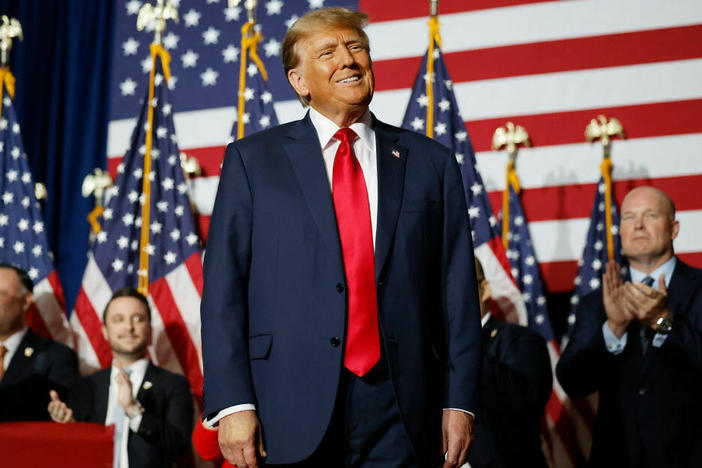 Former President Donald Trump speaks at his caucus night event Monday in Des Moines. Trump handily won the caucuses. The next contest of the primary season is in New Hampshire on Jan. 23.