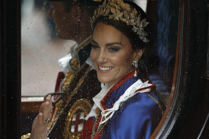 Kate, Princess of Wales, and Prince William travel in a coach following the coronation ceremony of Britain's King Charles III in London, on May 6, 2023. The Princess of Wales has been hospitalized for planned abdominal surgery and will remain at The London Clinic for up to two weeks, Kensington Palace said Wednesday.