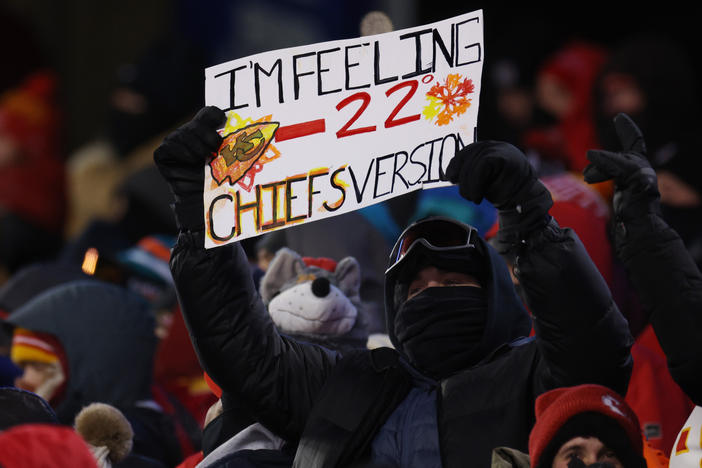 A Kansas City Chiefs fan holds a sign during the AFC Wild Card Playoffs between the Miami Dolphins and the Chiefs on Saturday in Kansas City, Mo.