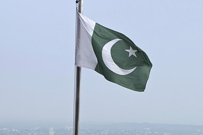 A Pakistani flag flies on a lookout in Islamabad, Pakistan, on July 27, 2022.