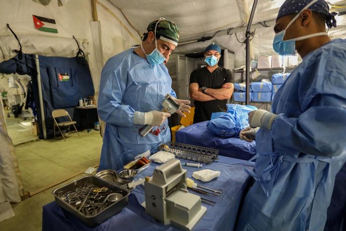 Dr. Ghassan Al-Suwaiti, a Jordanian plastic surgeon and burn specialist, performs an operation in December at Jordan's field hospital in Khan Younis.