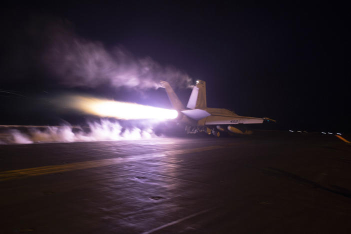 This image provided by the U.S. Navy shows an aircraft launching from USS Dwight D. Eisenhower (CVN 69) during flight operations in the Red Sea on Monday.