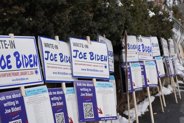 Signs line a driveway in Concord, N.H., waiting for volunteers to pick them up. President Biden is not on the New Hampshire primary ballot because of a dispute over Democratic Party rule changes.