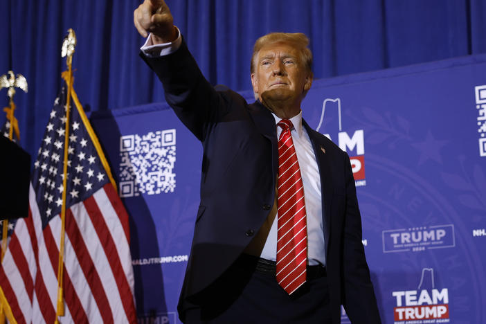 Former President Donald Trump acknowledges supporters at the end of a campaign rally on Jan. 14 in Concord, N.H.