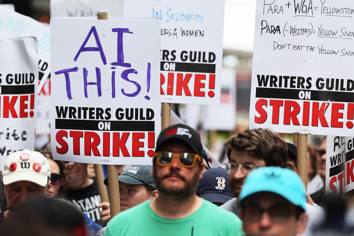 Members of the Writers Guild of America East picket at the Warner Bros. Discovery NYC office on July 13, 2023 in New York City.