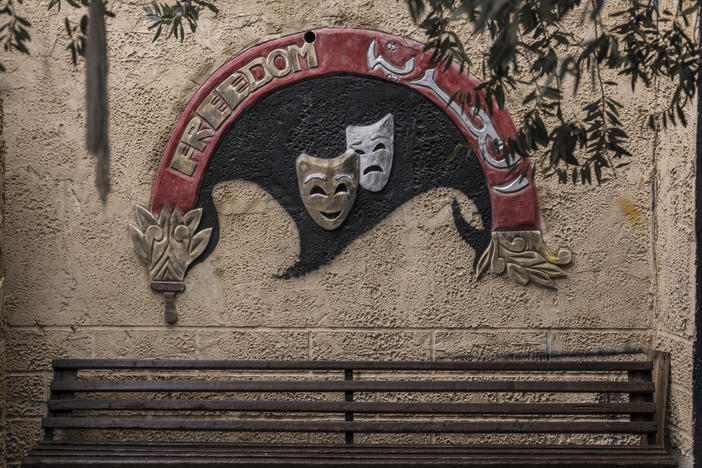 A bench is seen at the entrance of the Freedom Theatre in the Jenin refugee camp 10 days after a raid by Israeli forces, Dec. 23, 2023.