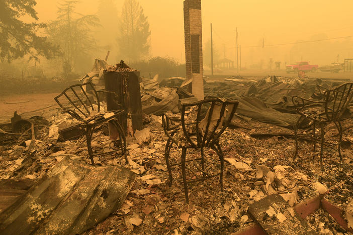Chairs stand at the local post office in the aftermath of a fire in Gates, Ore., on Sept 9, 2020. An Oregon jury on Tuesday awarded $85 million to nine victims of wildfires that ravaged the state in 2020, in the latest trial faced by utility PacifiCorp over its liability in the deadly blazes.