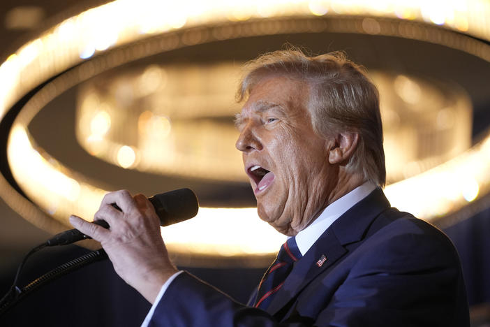 Republican presidential candidate former President Donald Trump speaks at a primary election night party after his win in the New Hampshire primary on Tuesday.
