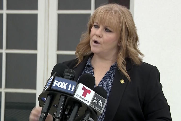 A still image taken from video provided courtesy of KABC-TV, shows Victorville sheriff's spokesperson Mara Rodriguez talks to the media during a news conference in Victorville, Calif., on Wednesday.