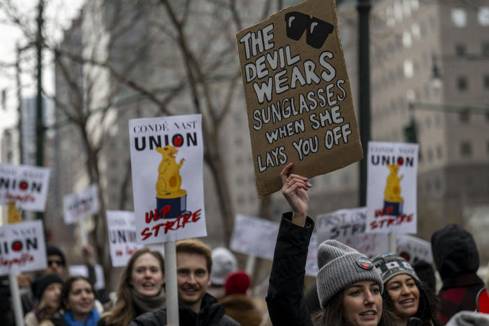 Unionized staff picket outside the Condé Nast offices in New York on Jan. 23. The company is merging the popular digital music publication Pitchfork with the men's magazine <em>GQ</em>, which has triggered anger over the resulting layoffs and concern for the outlet's future.