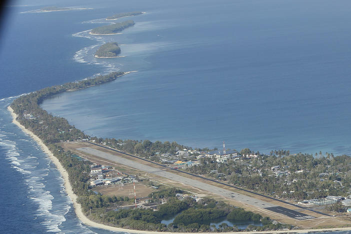 Funafuti, the main island of the nation state of Tuvalu, is photographed from a Royal New Zealand airforce C130 aircraft as it approaches the tiny South Pacific nation.