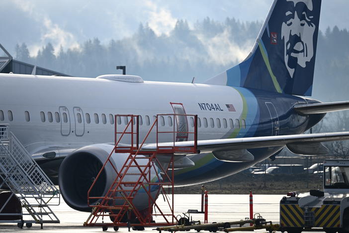 Alaska Airlines N704AL, a 737 Max 9, which made an emergency landing at Portland International Airport on Jan. 5, is parked at a maintenance hanger in Portland, Ore., this week.