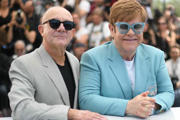 Elton John and Bernie Taupin promote the film <em>Rocketman</em> at the Cannes Film Festival in 2019.