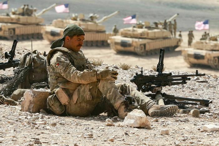 A soldier takes a break during the "Eager Lion" multinational military exercises that the U.S. is part of in Jordan in September 2022.