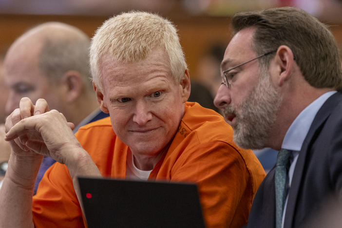 Alex Murdaugh, left, confers with Phil Barber during his hearing at the Richland County Judicial Center in Columbia, S.C., on Monday, Jan. 29, 2024.