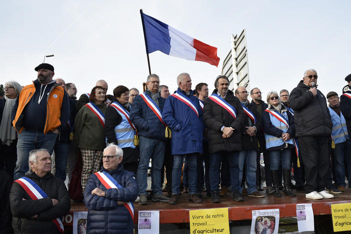 Jerome Guillem, mayor of Langon, and other French mayors, farmers and wine growers block highway entrances to the town of Langon, toward the A62 highway in Gironde, France, on Jan. 29.