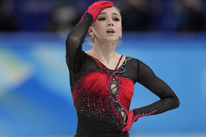 Russian figure skater Kamila Valieva reacts in the women's team free skate program during the figure skating competition at the 2022 Winter Olympics, Monday, Feb. 7, 2022, in Beijing.