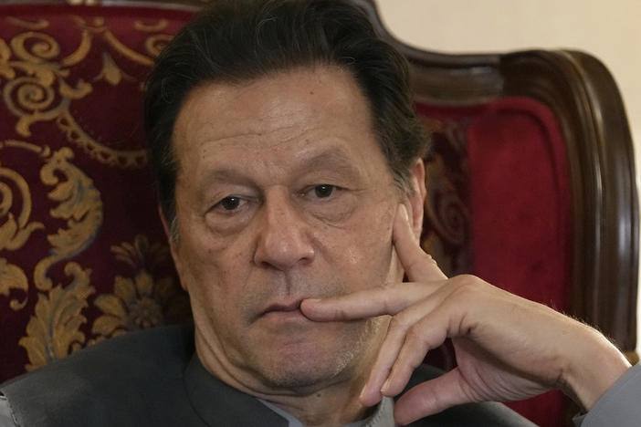 Former Prime Minister Imran Khan listens to a member of the media during a talk with reporters regarding the current political situation and the ongoing cases against him at his residence in Lahore, Pakistan, on Aug. 3, 2023.